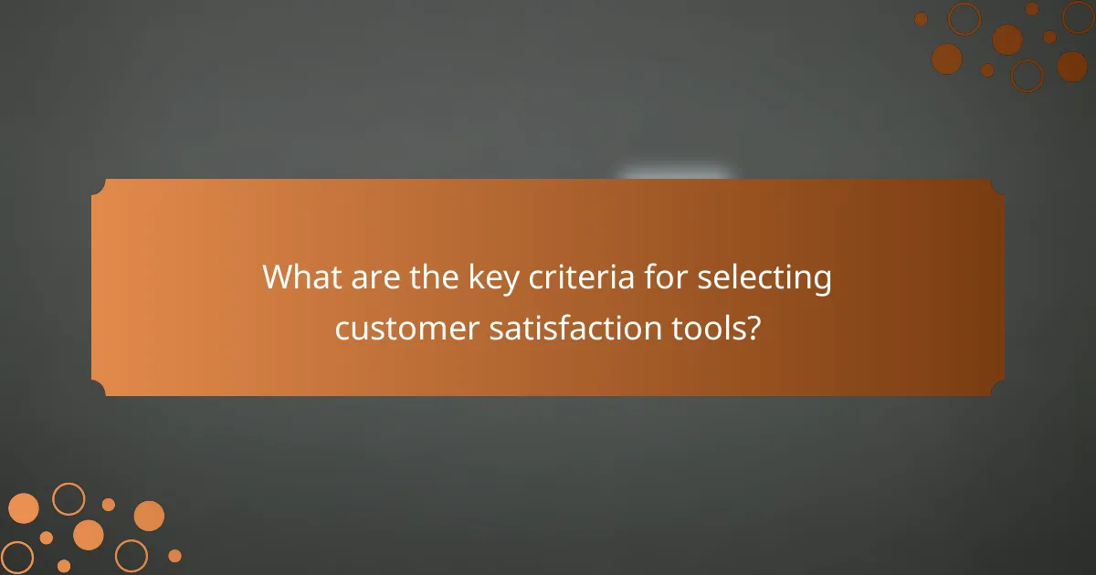 What are the key criteria for selecting customer satisfaction tools?